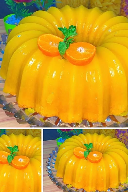 Pastel casero de mandarina esponjoso y dorado, relleno con una suave crema cítrica, decorado con rodajas de mandarina y espolvoreado con azúcar glas.